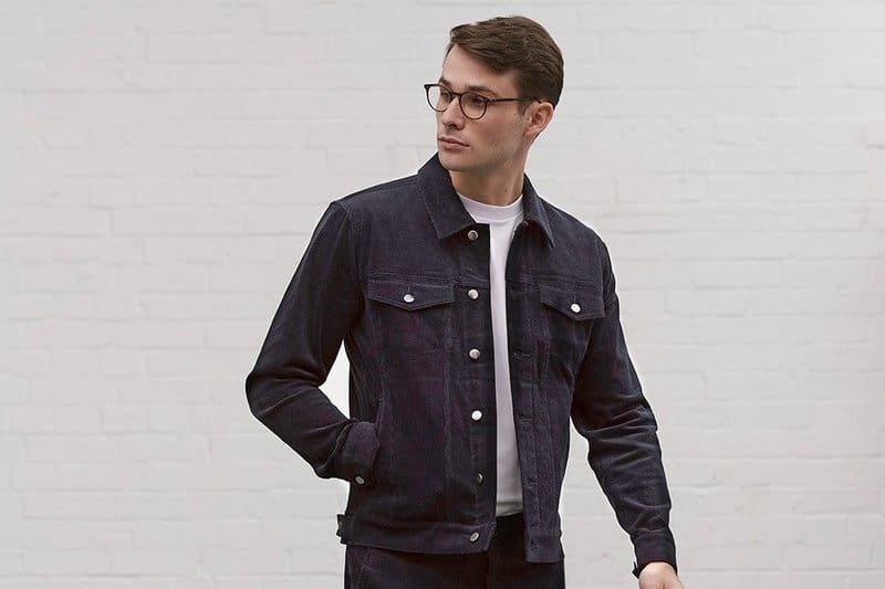 man wearing denim jacket