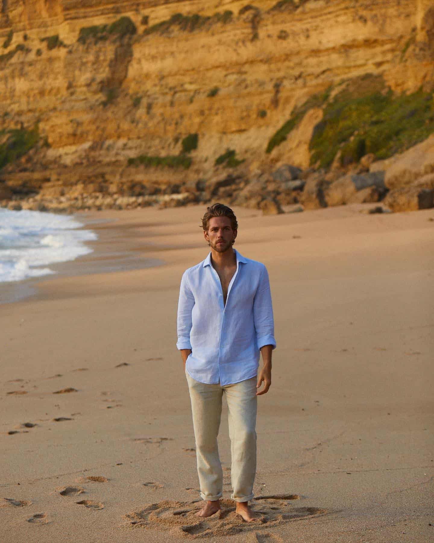 man in a shirt by the beach