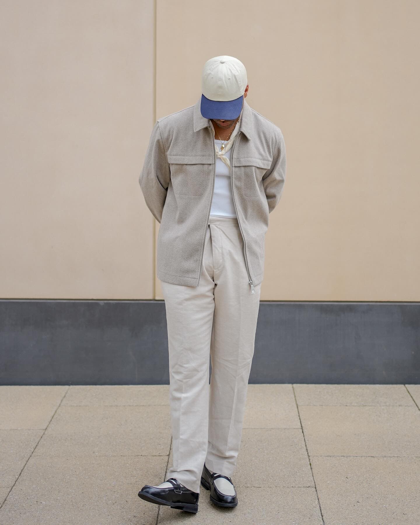 man admiring his loafers