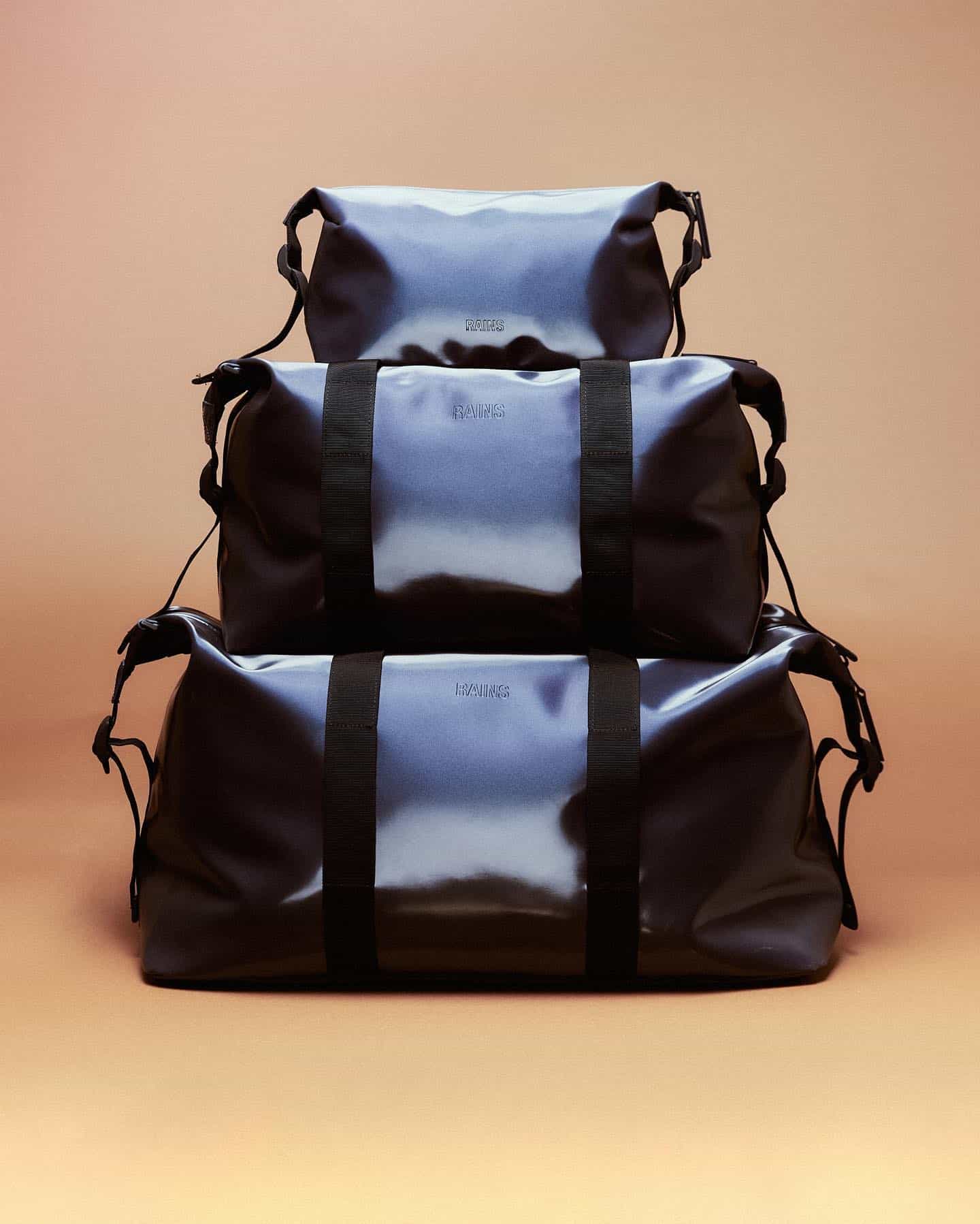 a stack of hilo weekend bags by rains