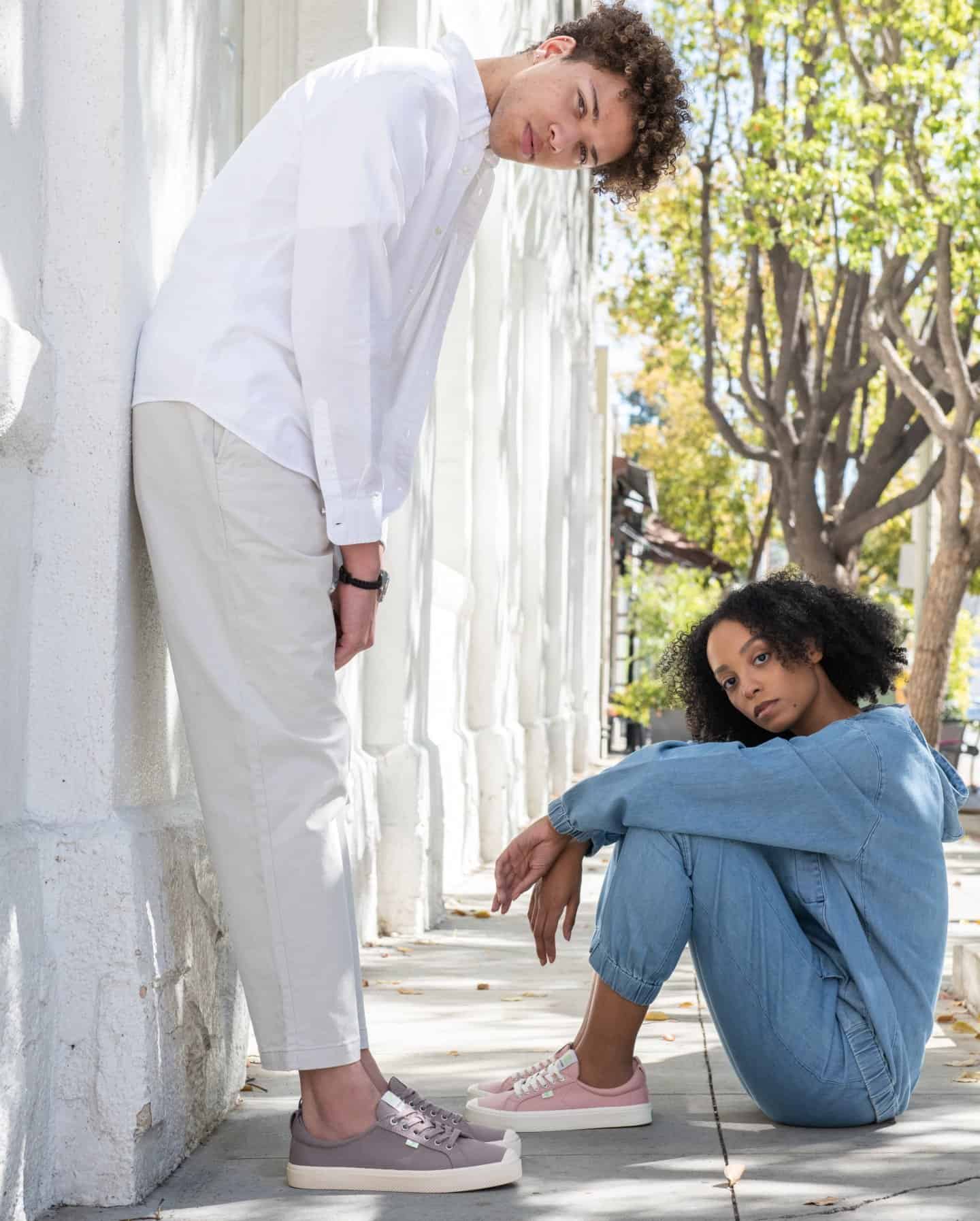 couple wearing unisex sneakers