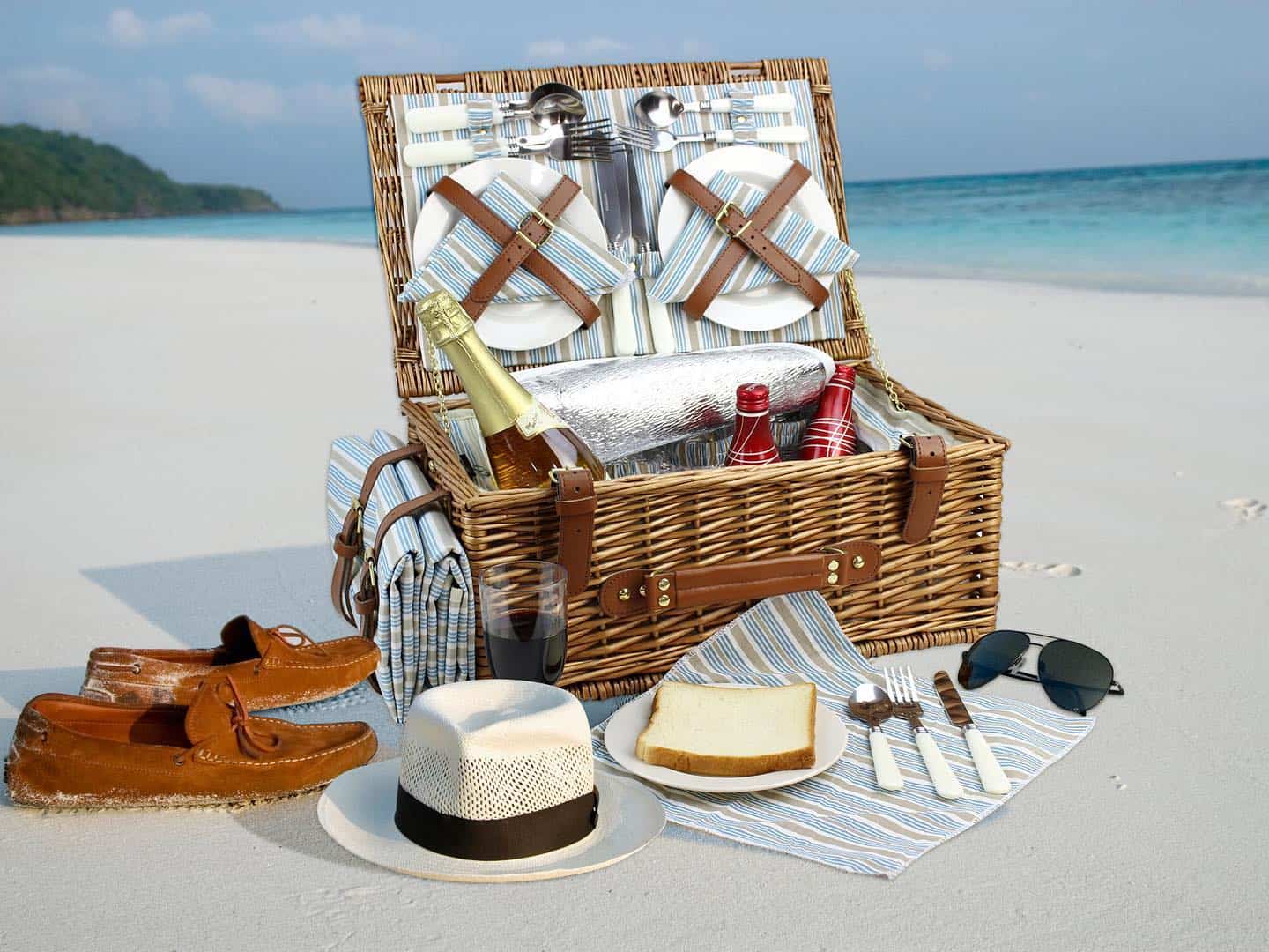 a picnic basket at the beach