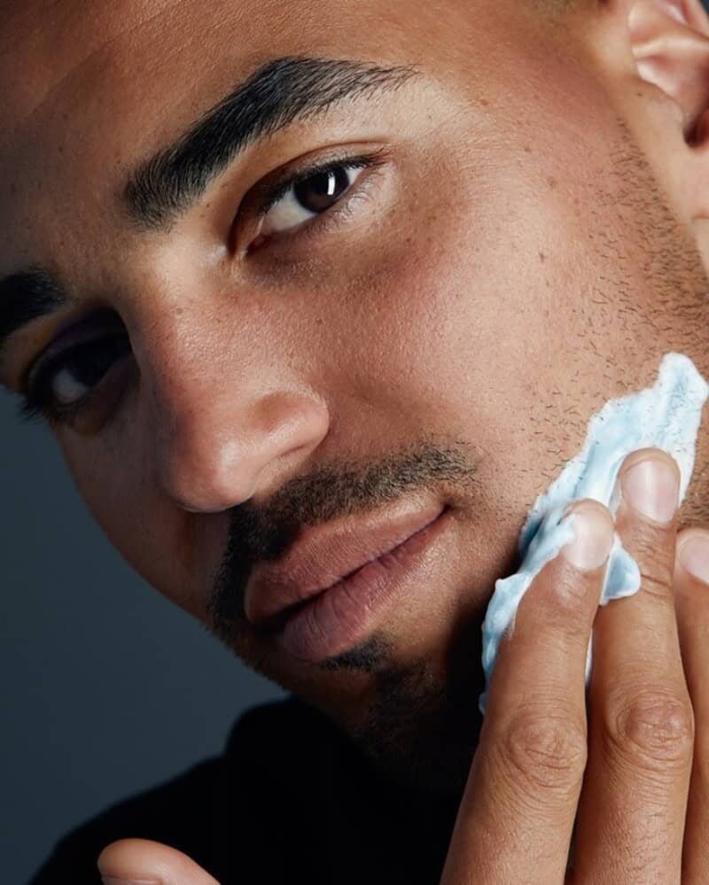 man applying the nivea men shaving gel