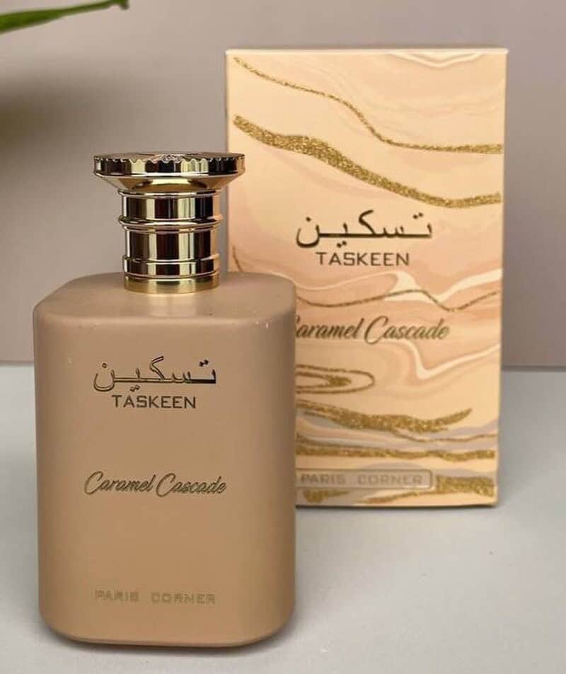 a bottle of Taskeen Caramel Cascade Cologne with box