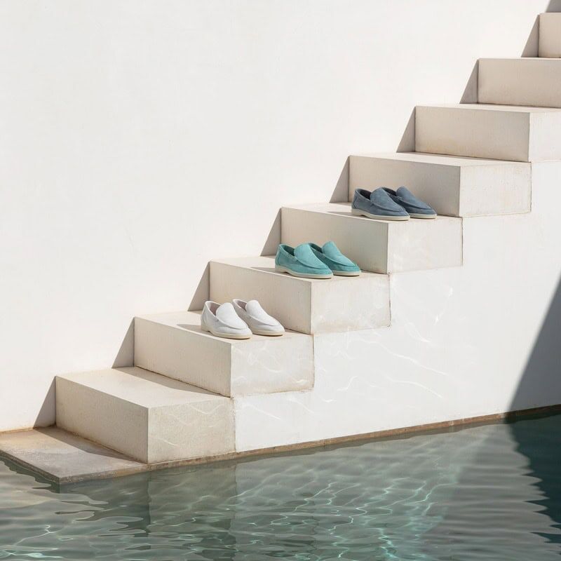 three pairs of Aurelien Yatch Loafers on the stairs by the pool