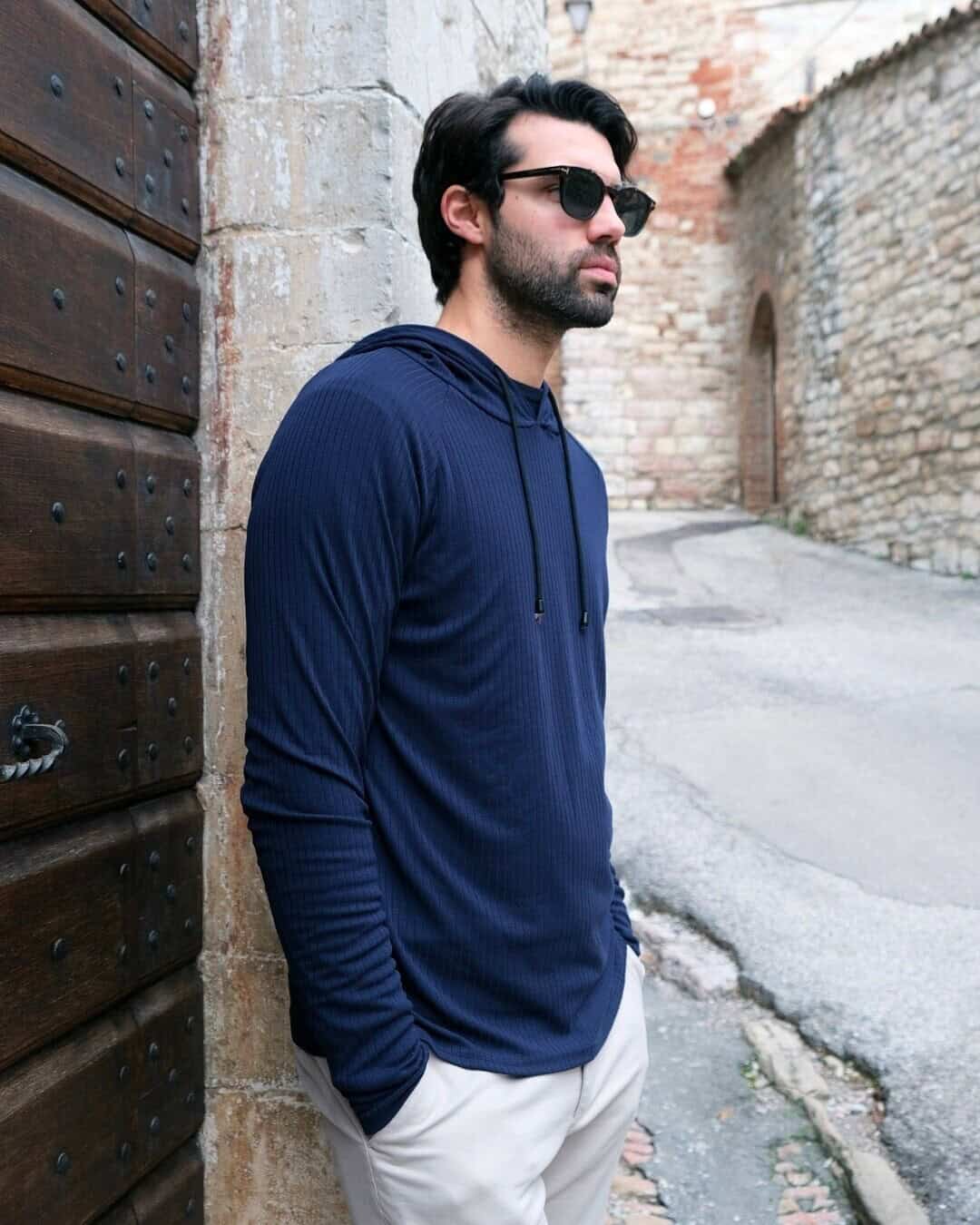 man wearing blue hooded sweatshirt by coofandy