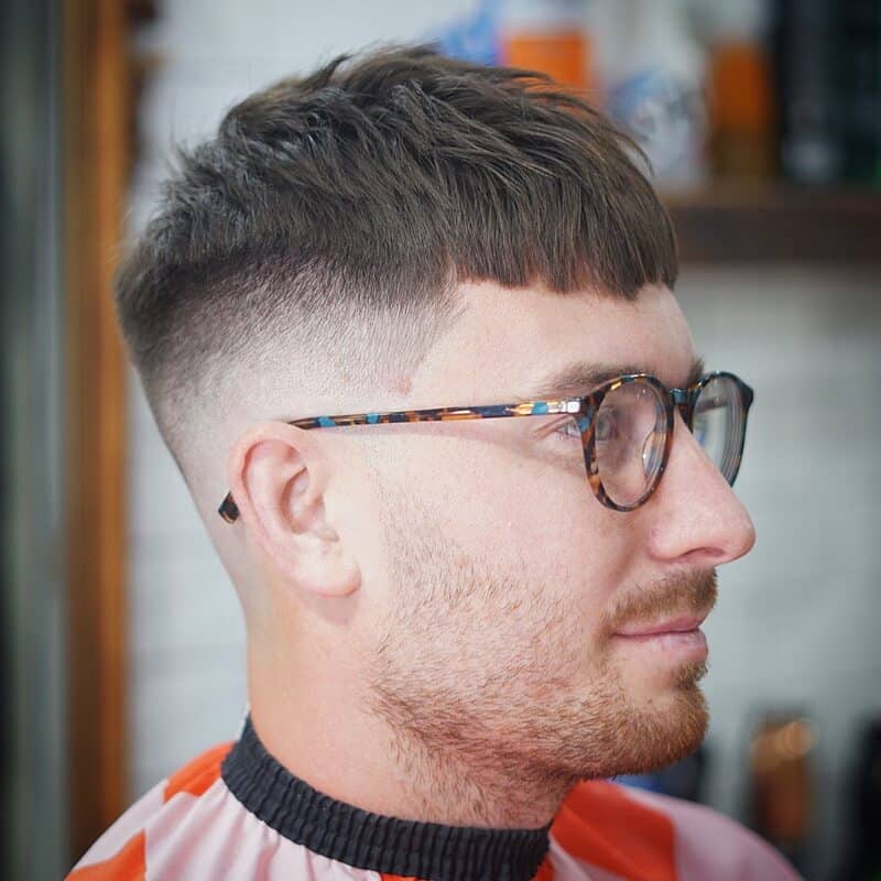 man with a textured crop haircut